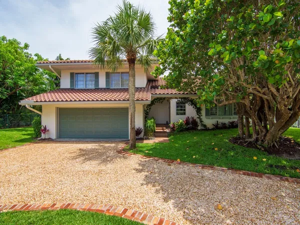 a view of house with outdoor space and street view