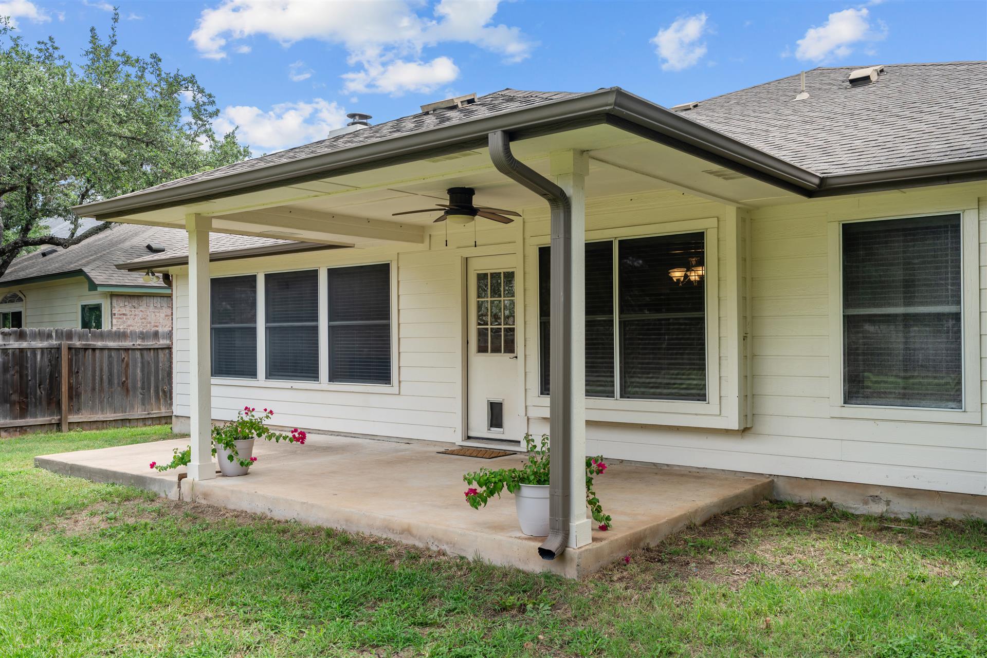 4725 Tello Path Austin, TX 78749 - Photo 31 of 34 An inviting covered patio offers outdoor living space overlooking the fenced yard.