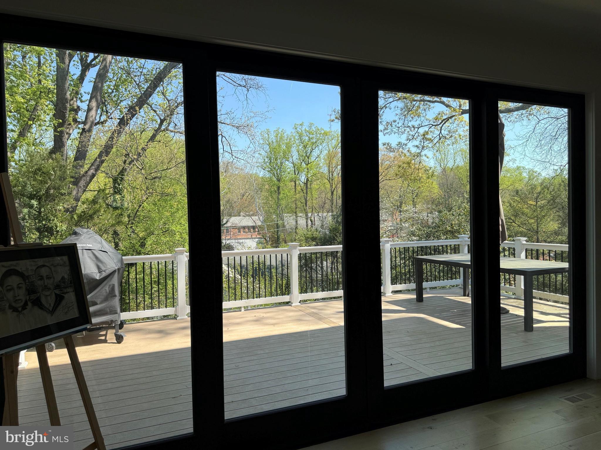 5613 Namakagan Road Bethesda, MD 20816 - Photo 6 of 6 Wall of windows and glass doors