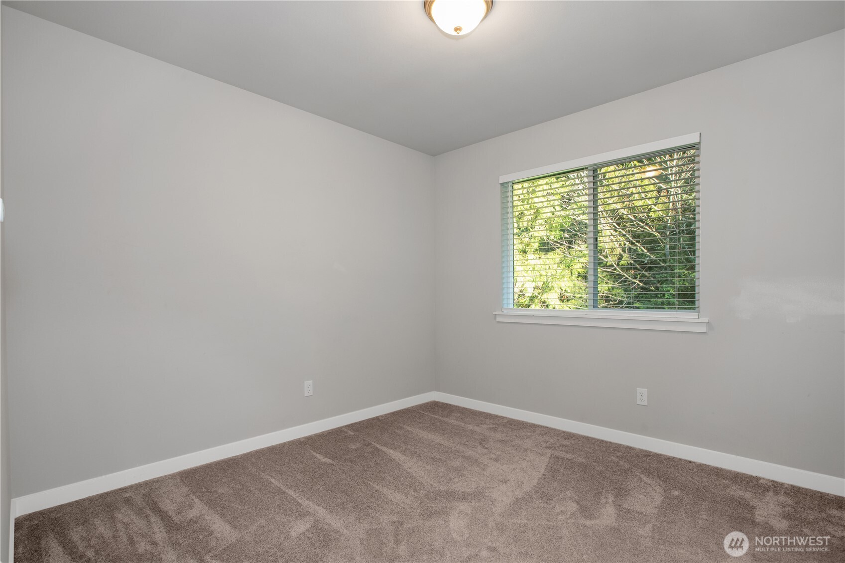 17643 Loop Lane Southeast Yelm, WA 98597 - Photo 15 of 34 an empty room with a window