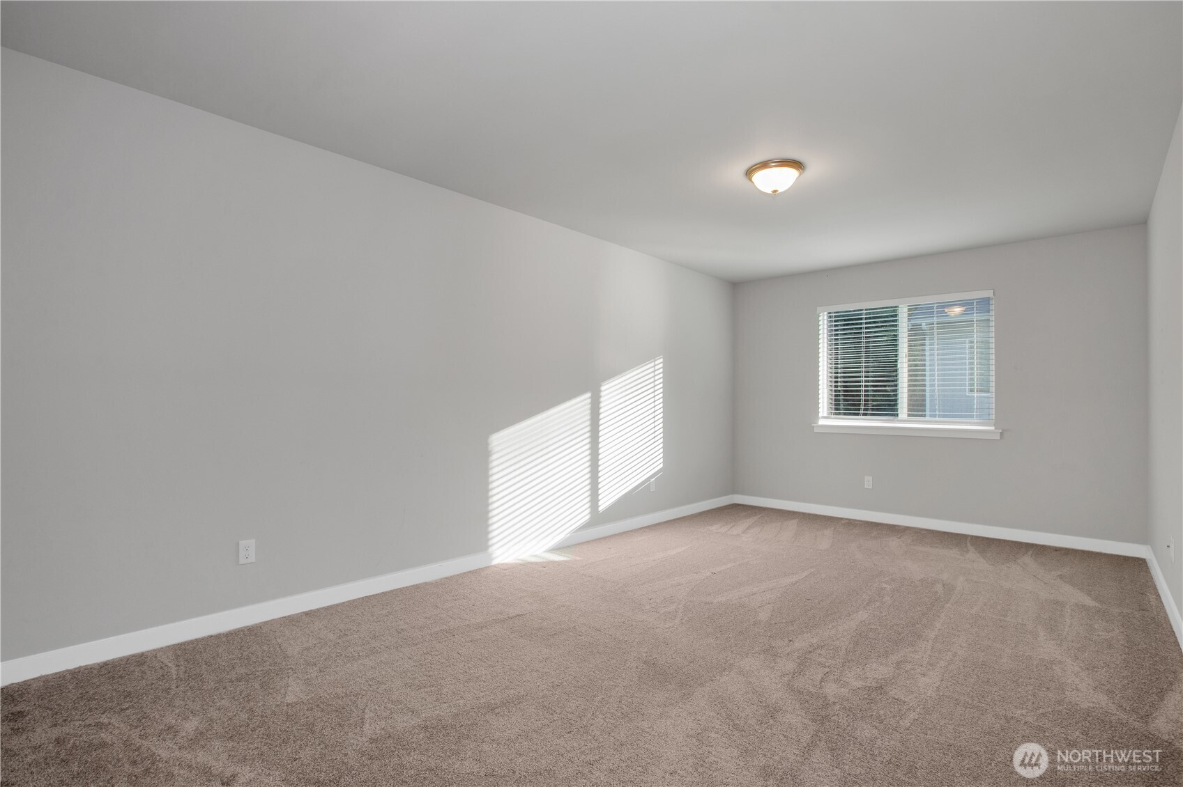 17643 Loop Lane Southeast Yelm, WA 98597 - Photo 18 of 34 an empty room with windows