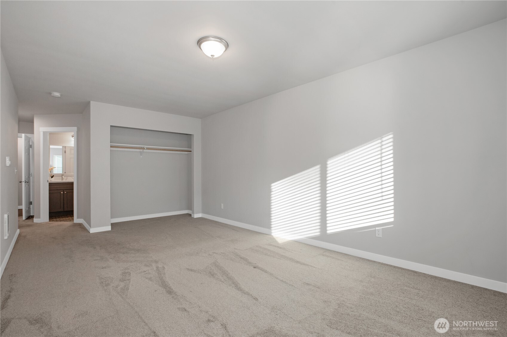 17643 Loop Lane Southeast Yelm, WA 98597 - Photo 20 of 34 an empty room with windows