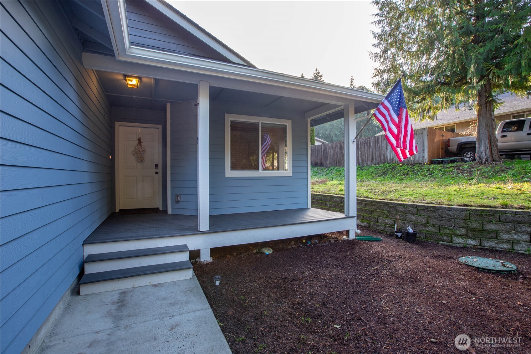 17643 Loop Lane Southeast Yelm, WA 98597 - Photo 2 of 34 a view of a house with a yard