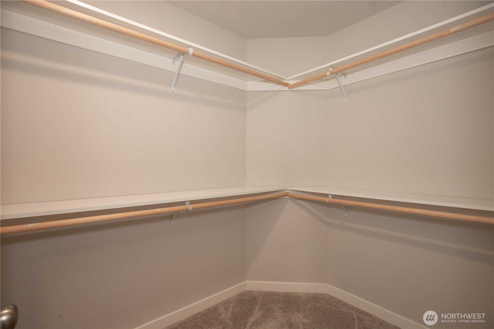 17643 Loop Lane Southeast Yelm, WA 98597 - Photo 22 of 34 a view of a room with racks on the wall