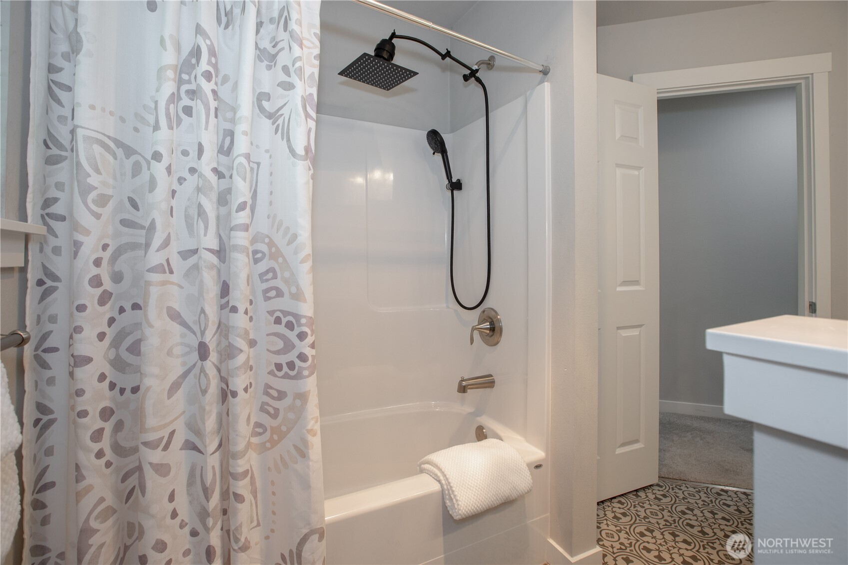 17643 Loop Lane Southeast Yelm, WA 98597 - Photo 24 of 34 a bathroom with a shower and a toilet