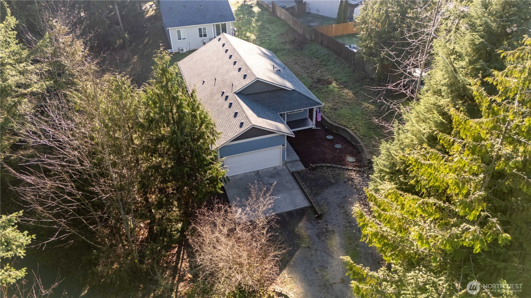17643 Loop Lane Southeast Yelm, WA 98597 - Photo 30 of 34 a view of a house with a yard