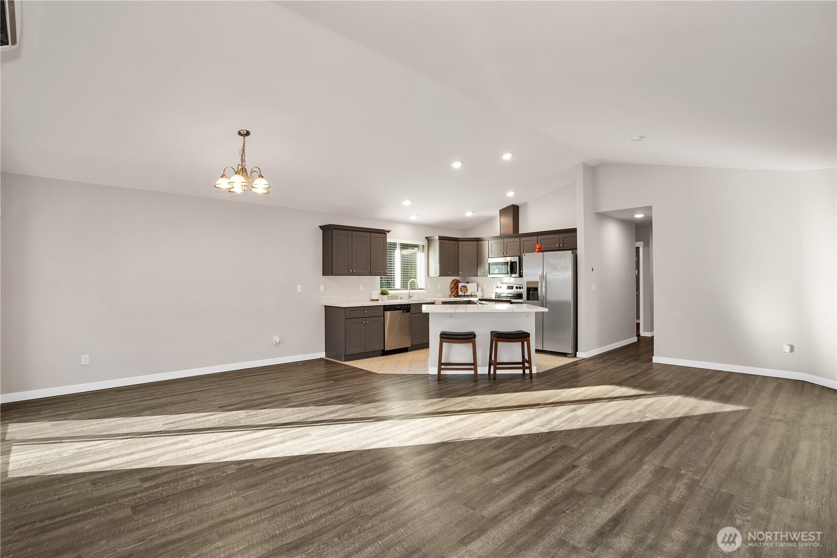17643 Loop Lane Southeast Yelm, WA 98597 - Photo 10 of 34 a view of kitchen with microwave and cabinets