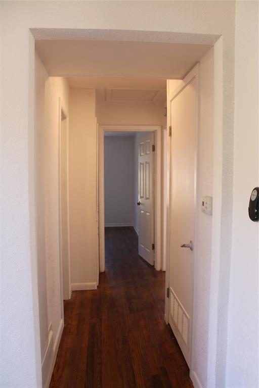 101 North 2 Nd Mullin, TX 76864 - Photo 12 of 34 a view of a hallway with wooden floor