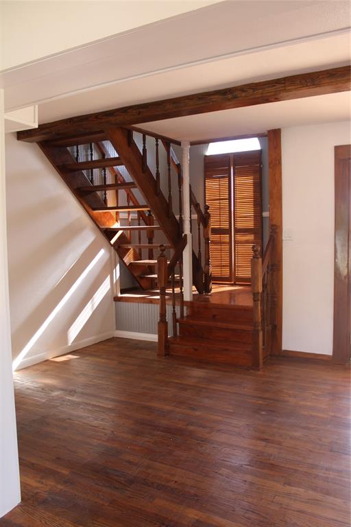 101 North 2 Nd Mullin, TX 76864 - Photo 13 of 34 a view of entryway and hall with wooden floor