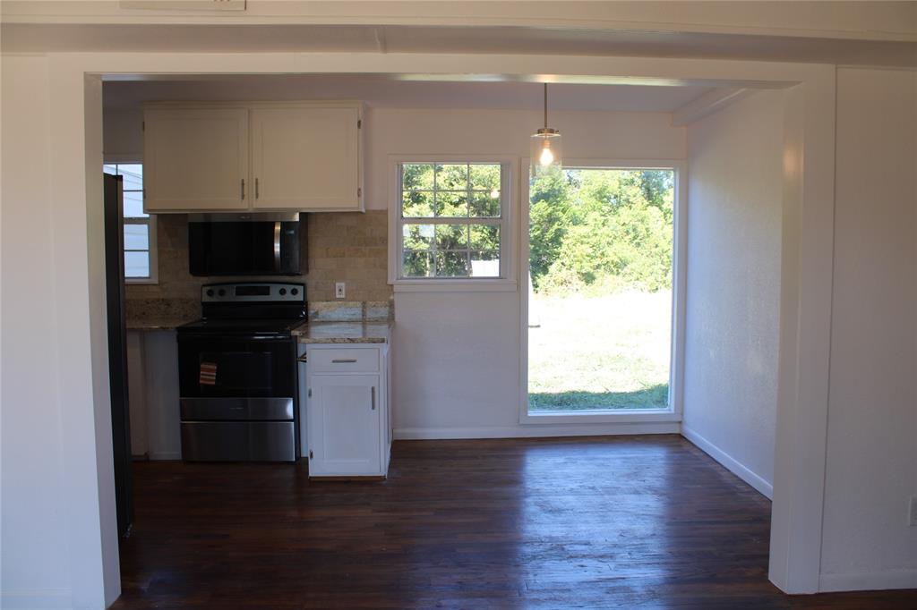 101 North 2 Nd Mullin, TX 76864 - Photo 20 of 34 a kitchen with a sink and a window