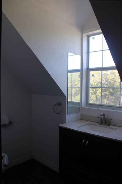 101 North 2 Nd Mullin, TX 76864 - Photo 27 of 34 a kitchen with a sink a window and cabinets