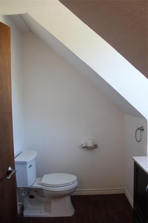 101 North 2 Nd Mullin, TX 76864 - Photo 29 of 34 a white toilet sitting next to a white wall