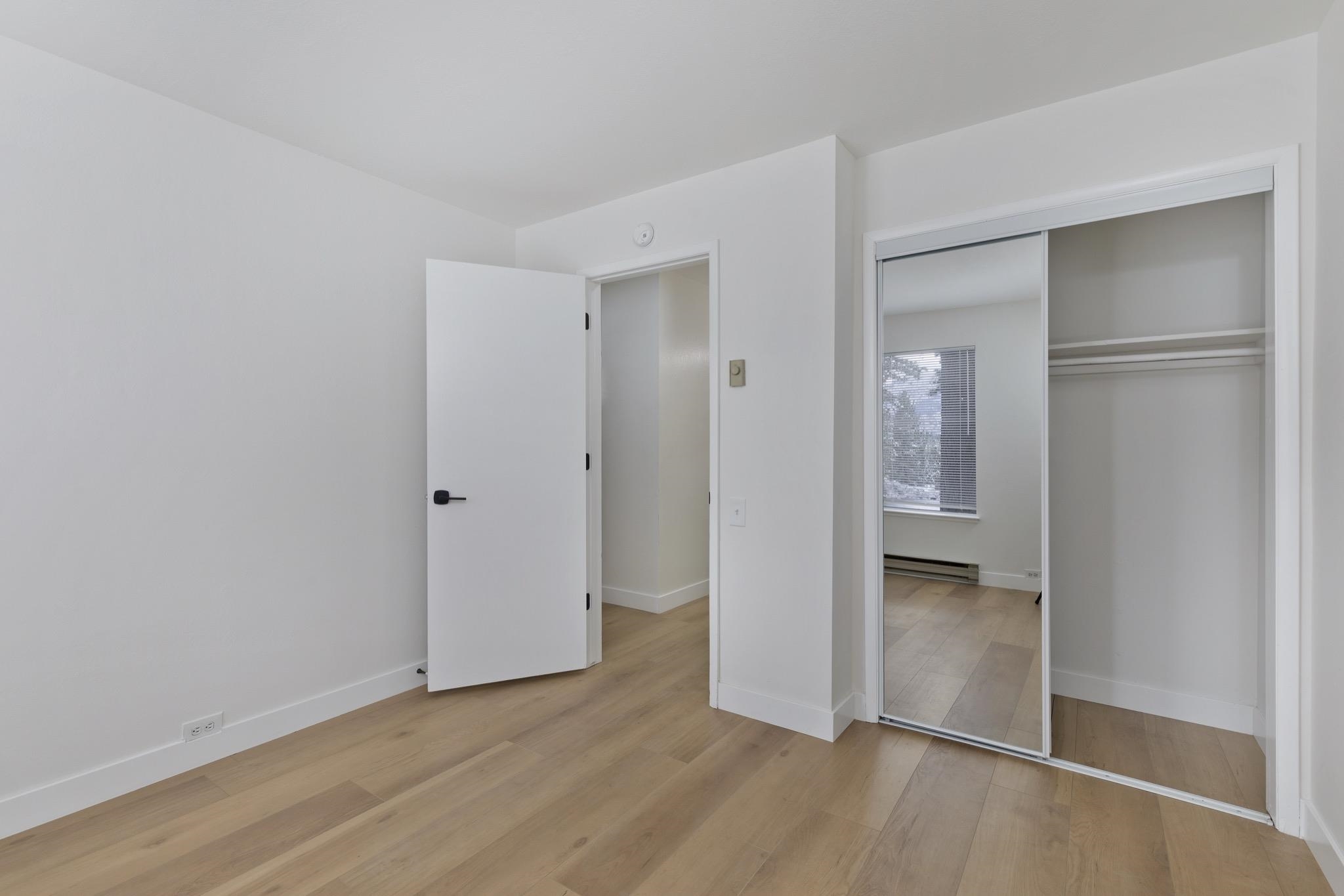152 Viewpoint Road, Unit 105 Mammoth Lakes, CA 93546 - Photo 19 of 29 a view of empty room with wooden floor