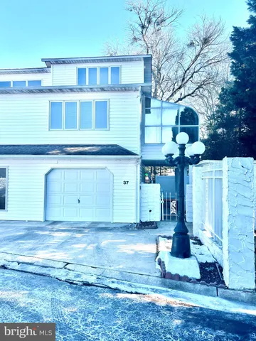 a view of a house with a park