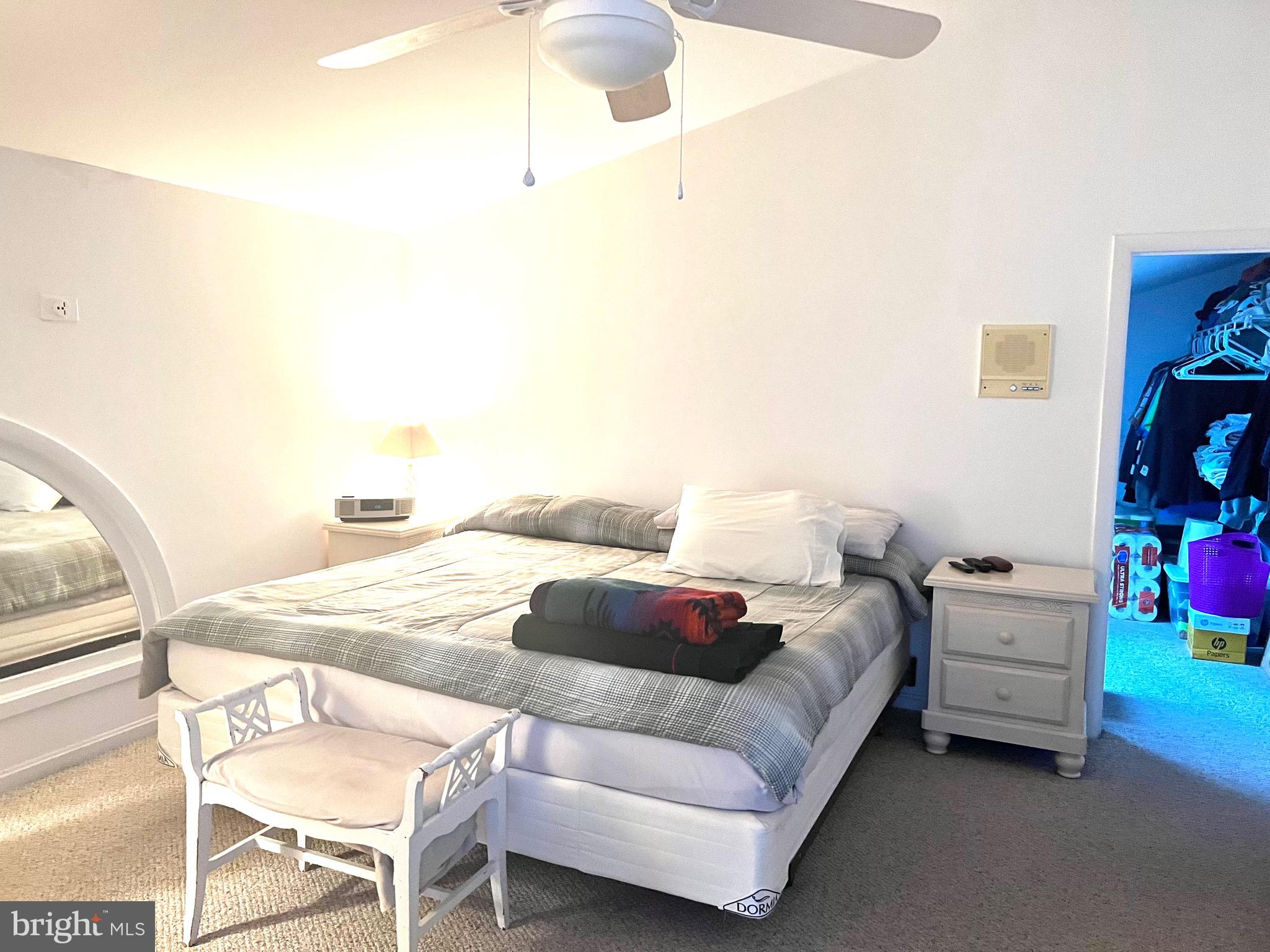 37 Hunters Point Millsboro, DE 19966 - Photo 11 of 38 a bedroom with a bed and a chandelier