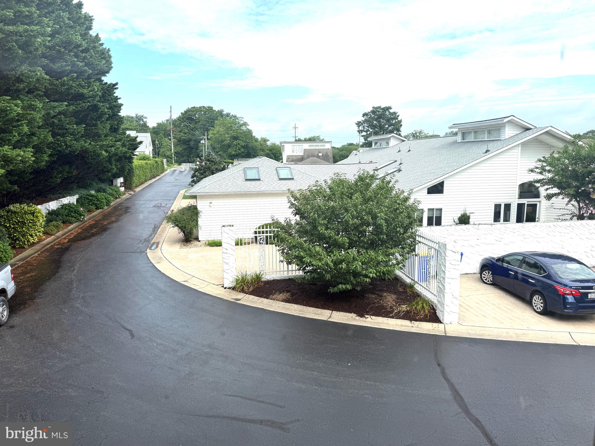 37 Hunters Point Millsboro, DE 19966 - Photo 21 of 38 a view of a house with a yard and garage