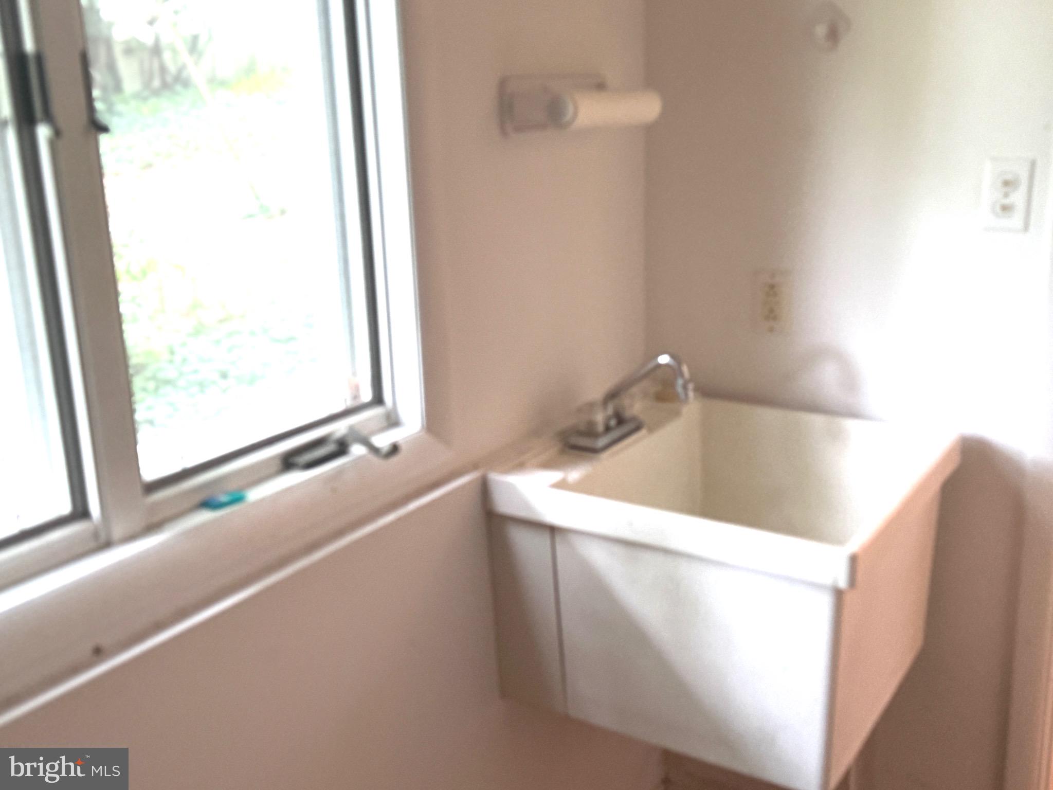37 Hunters Point Millsboro, DE 19966 - Photo 37 of 38 a close view of a sink and a bathtub in a bathroom