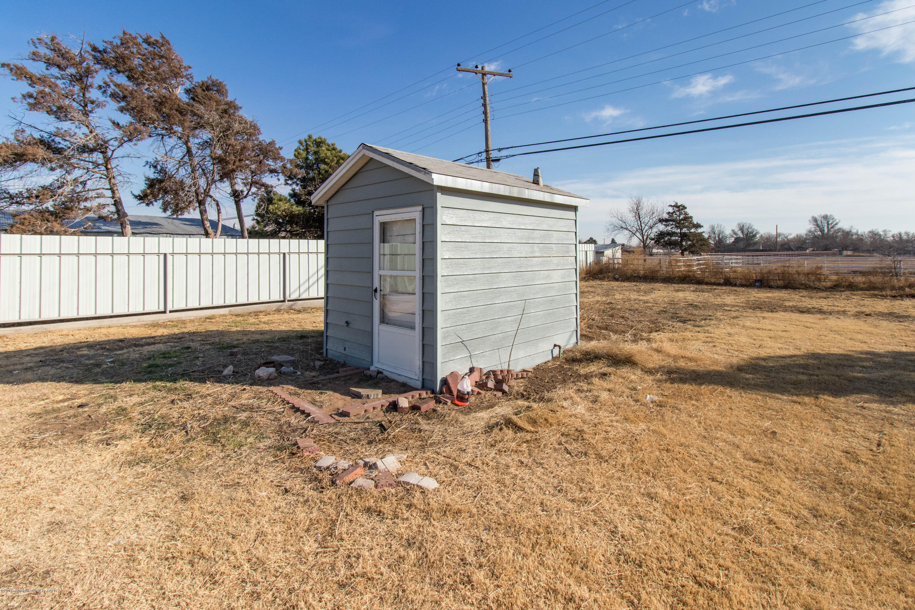 5015 Arden Road Amarillo, TX 79110 - Photo 35 of 38 a view of a backyard of the house