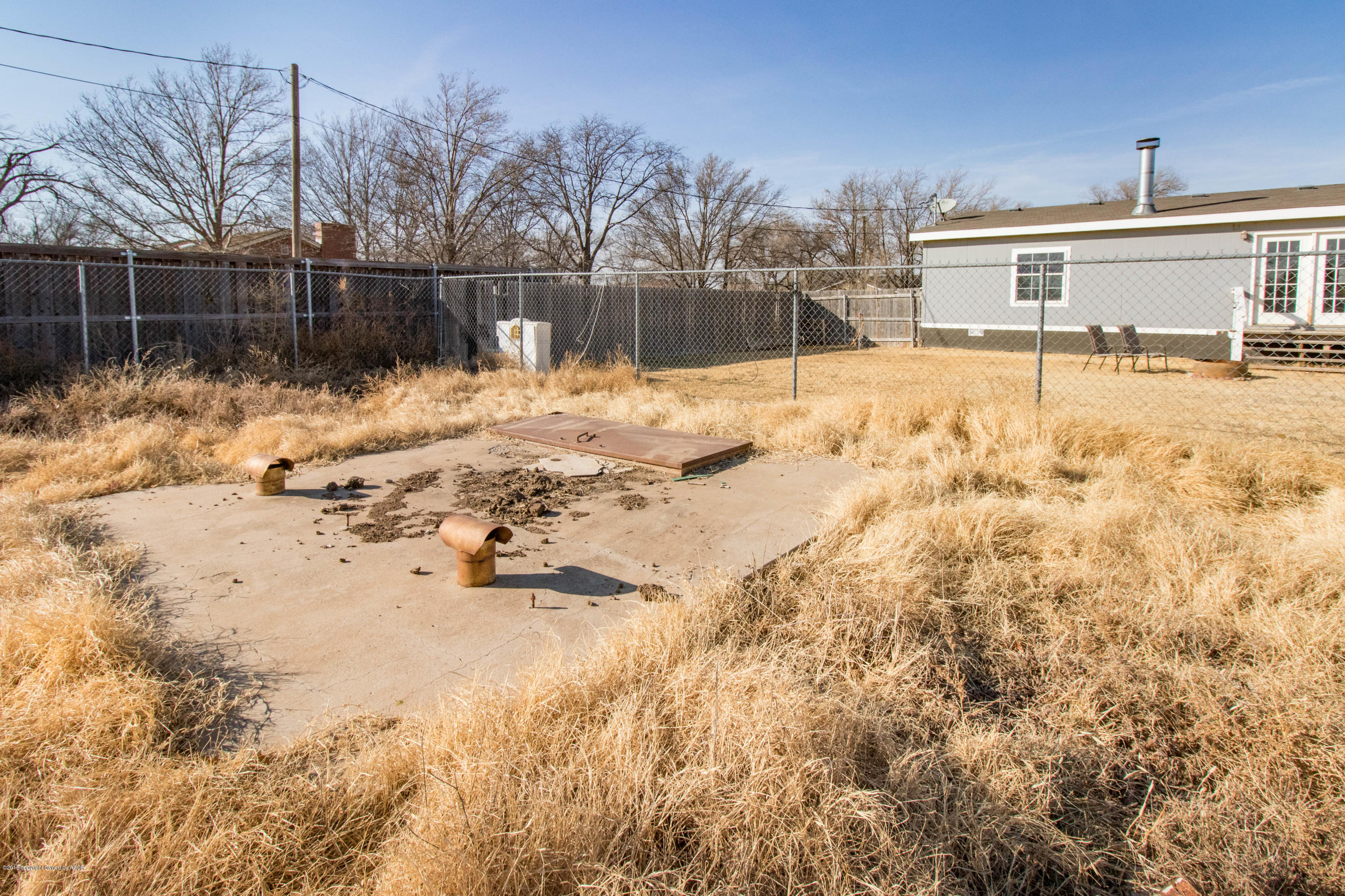 5015 Arden Road Amarillo, TX 79110 - Photo 38 of 38 a swimming pool view with wooden fencing
