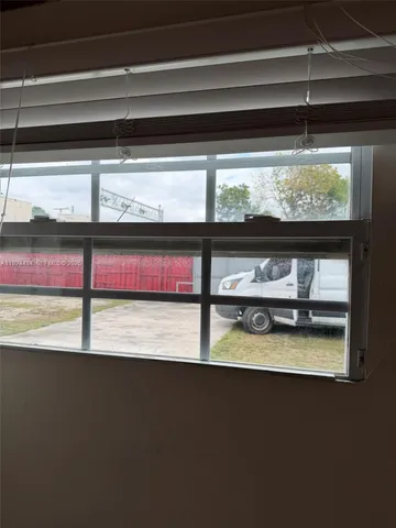 a view of a living room and a fireplace