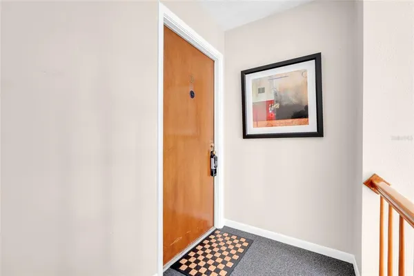 a view of a bedroom with a hallway