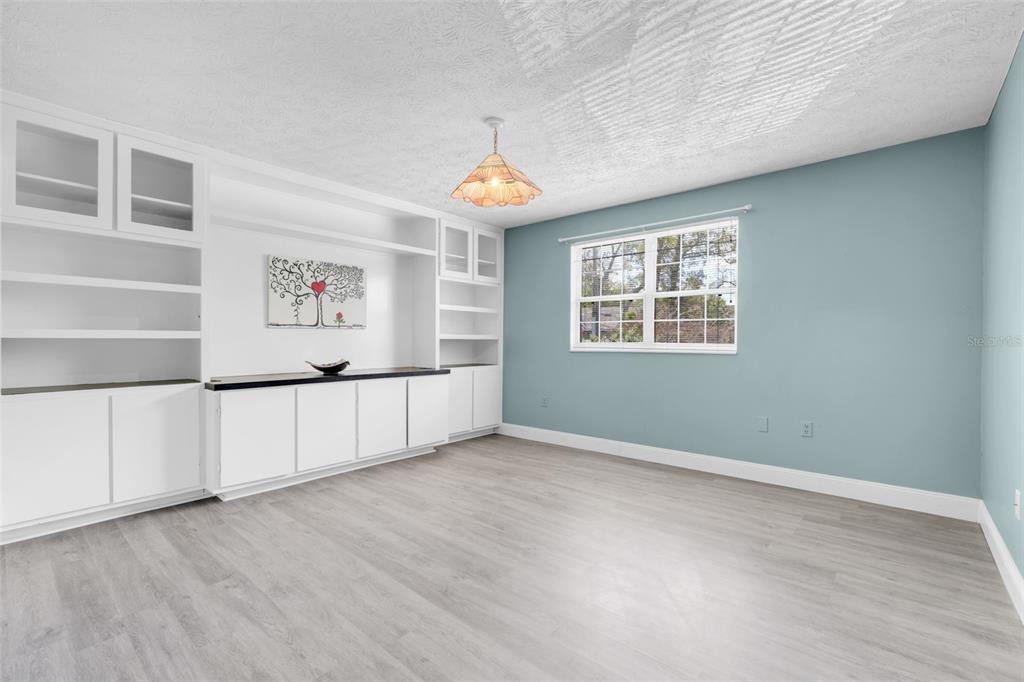 4224 Lake Underhill Road, Unit 8B8 Orlando, FL 32803 - Photo 24 of 47 an empty room with windows