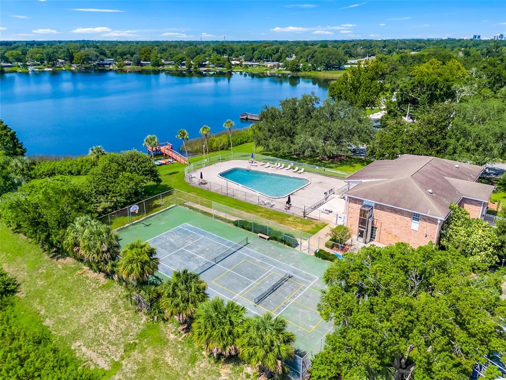 4224 Lake Underhill Road, Unit 8B8 Orlando, FL 32803 - Photo 44 of 47 an aerial view of a house with a lake view
