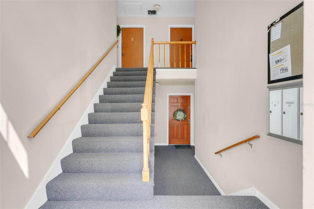 4224 Lake Underhill Road, Unit 8B8 Orlando, FL 32803 - Photo 10 of 47 a view of an entryway with staircase
