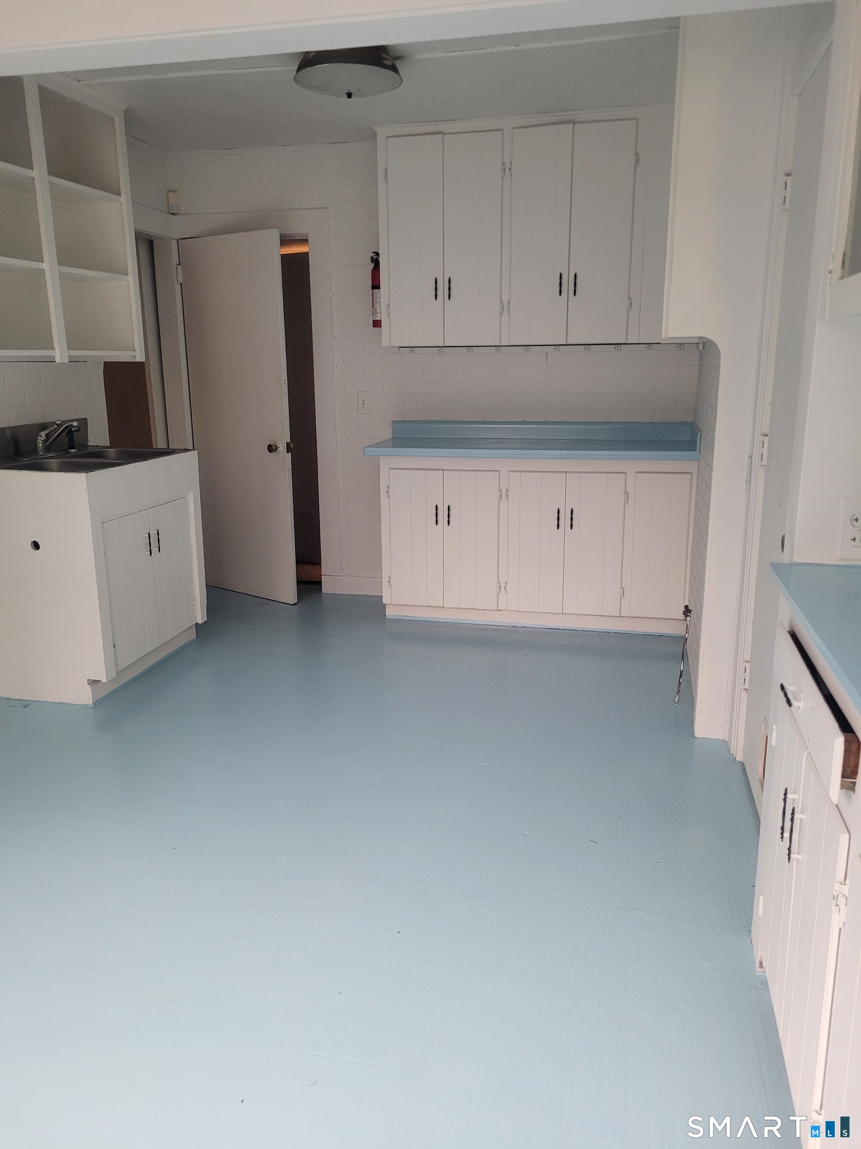 123 Bridge Street Groton, CT 06340 - Photo 20 of 22 a view of cabinets