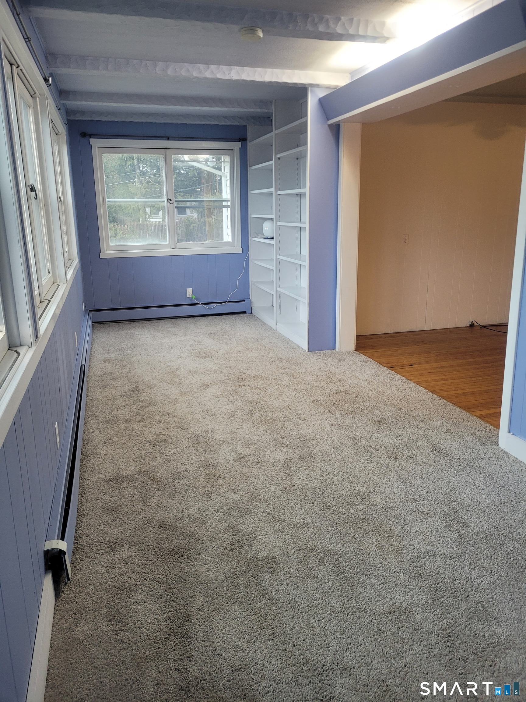 123 Bridge Street Groton, CT 06340 - Photo 10 of 22 an empty room with windows