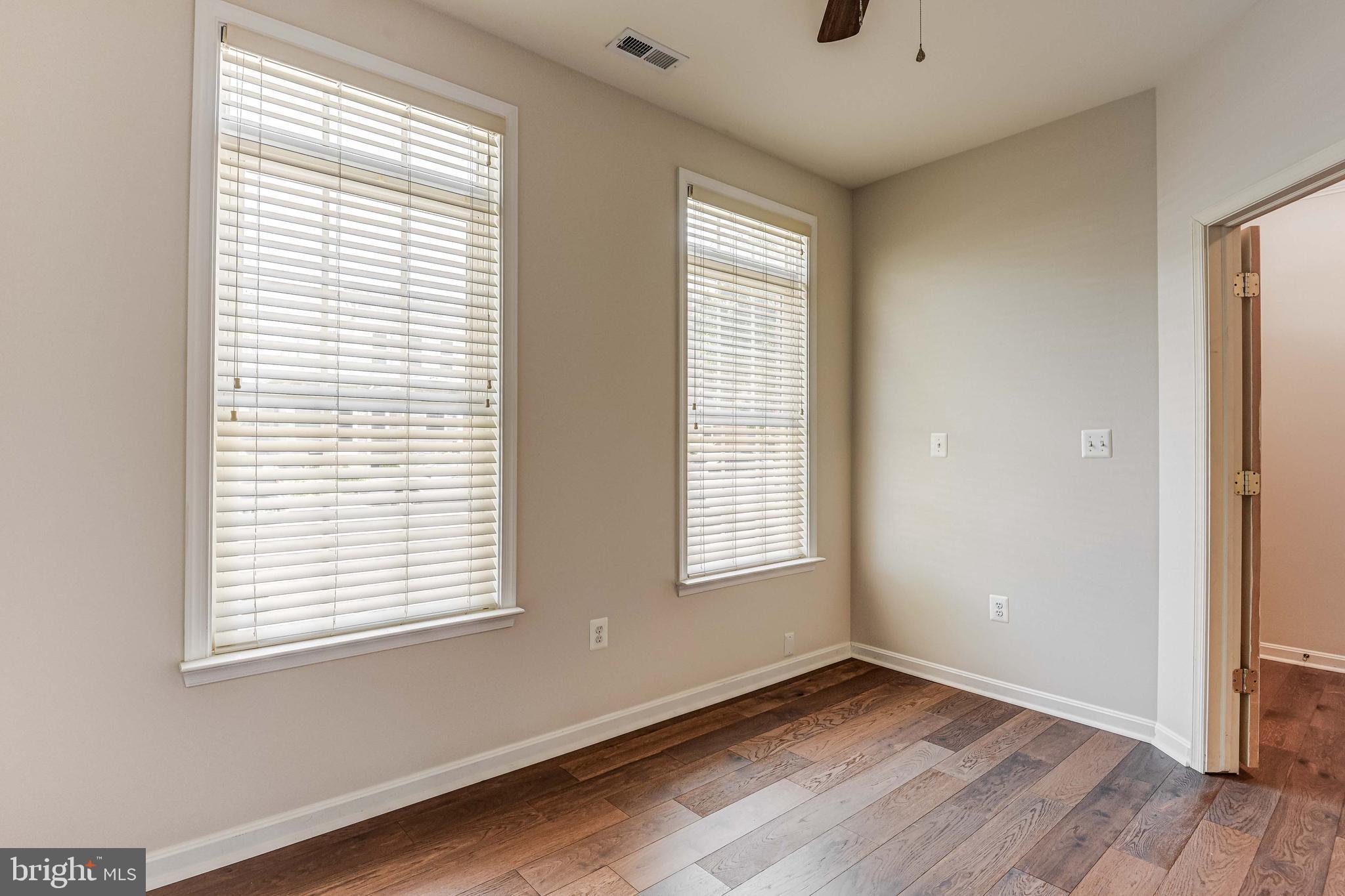 1306 Decatur Street Baltimore, MD 21230 - Photo 5 of 45 Wood Floors, Ceiling Fan, Blinds