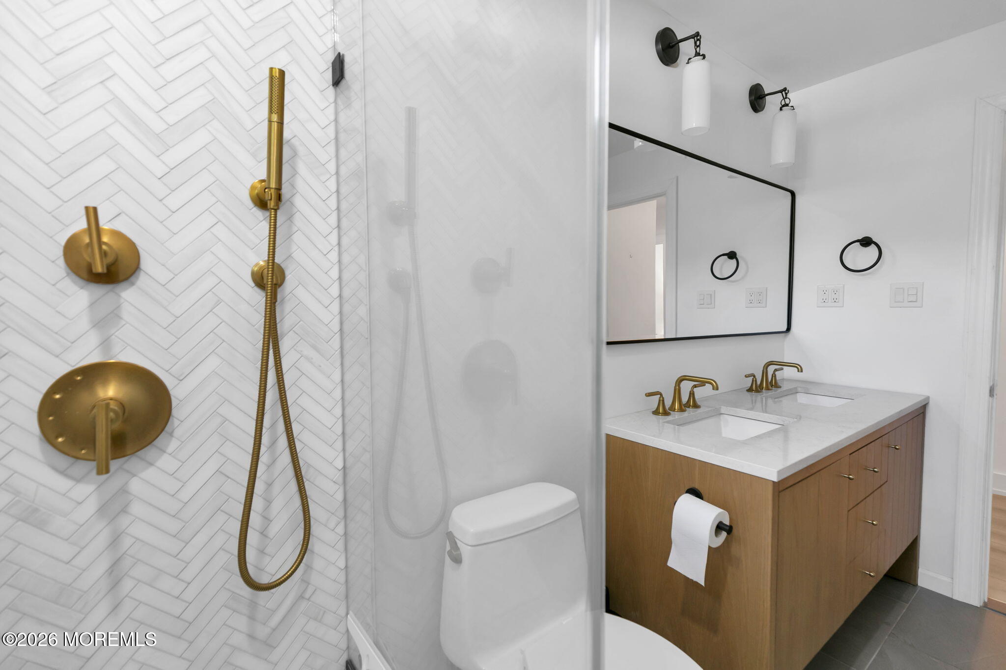 53 Field Avenue Red Bank, NJ 07701 - Photo 14 of 39 a bathroom with a sink and mirror