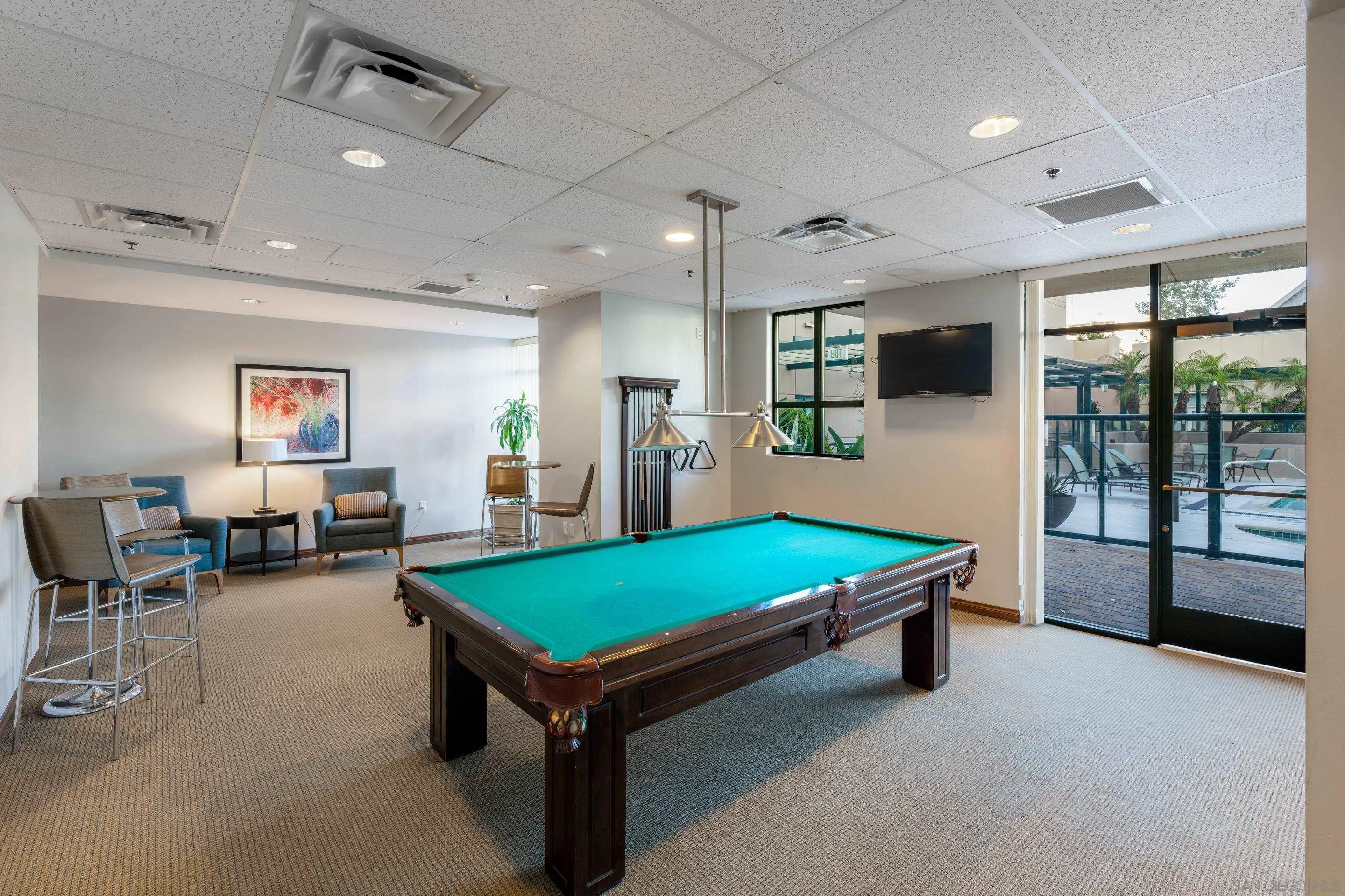 555 Front Street, Unit 303 San Diego, CA 92101 - Photo 33 of 35 a room with pool table and windows