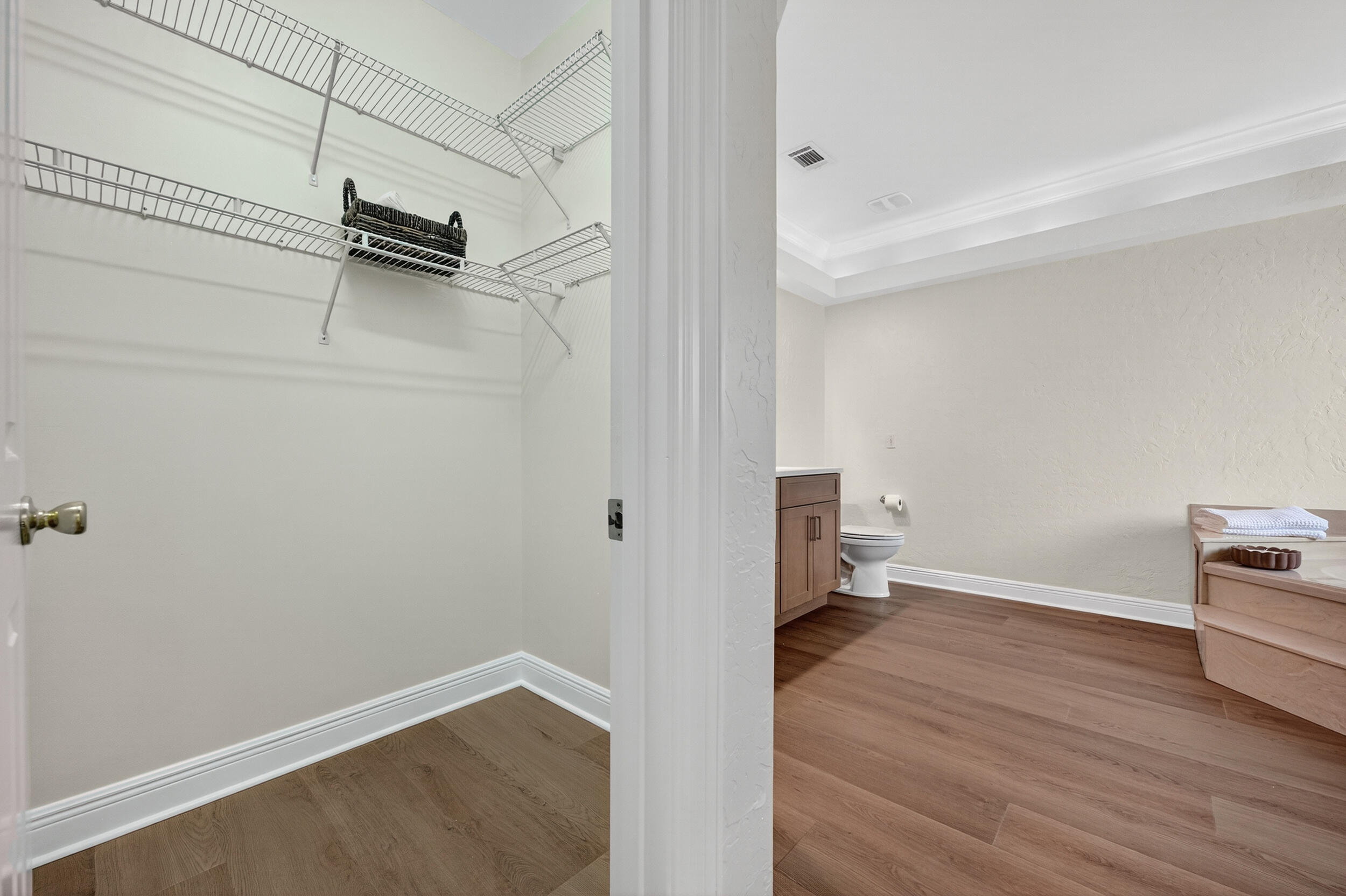 2805 Sam Snead Court Shalimar, FL 32579 - Photo 31 of 56 a view of empty room with wooden floor