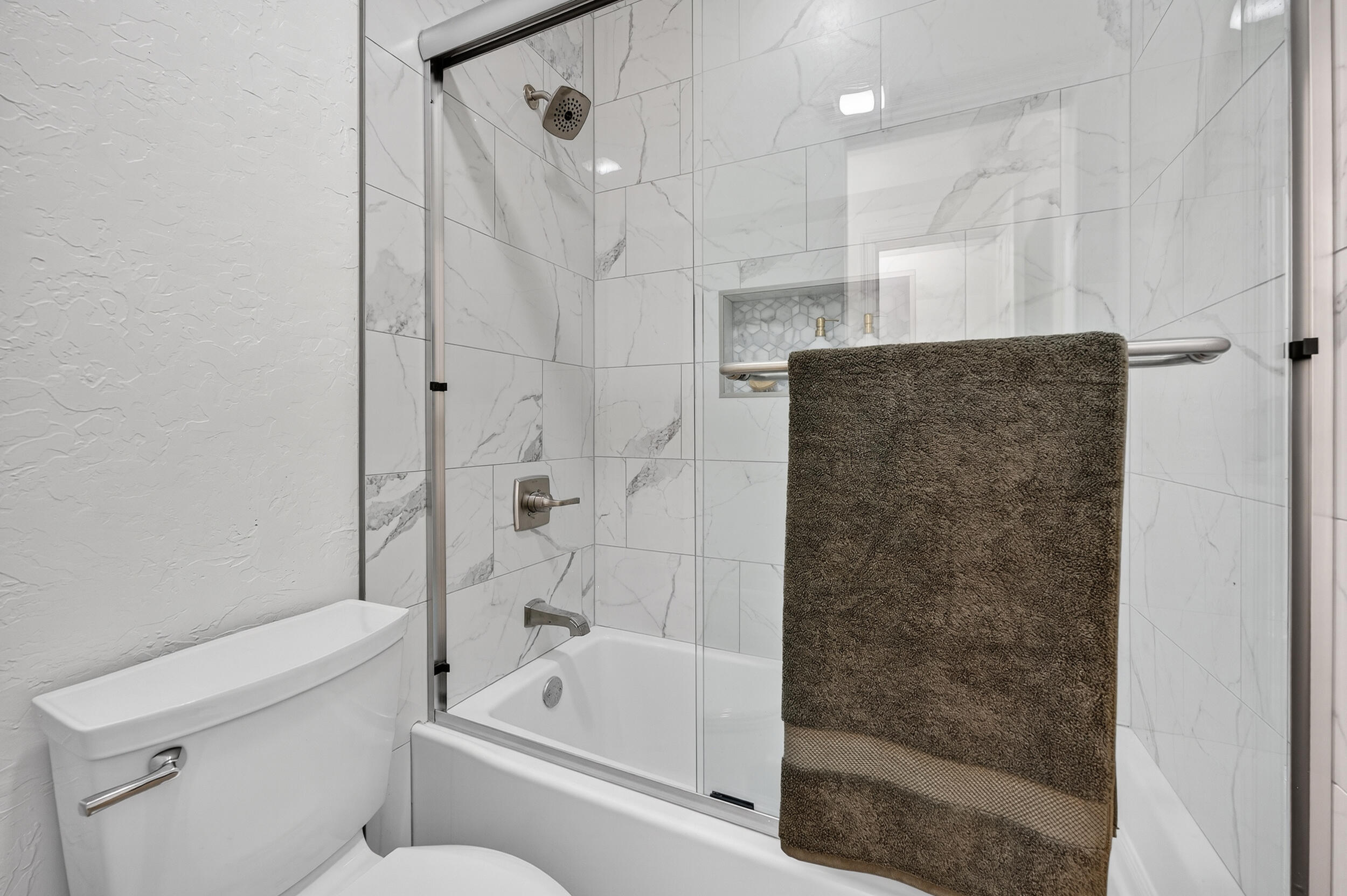 2805 Sam Snead Court Shalimar, FL 32579 - Photo 48 of 56 a bathroom with a bathtub and a shower