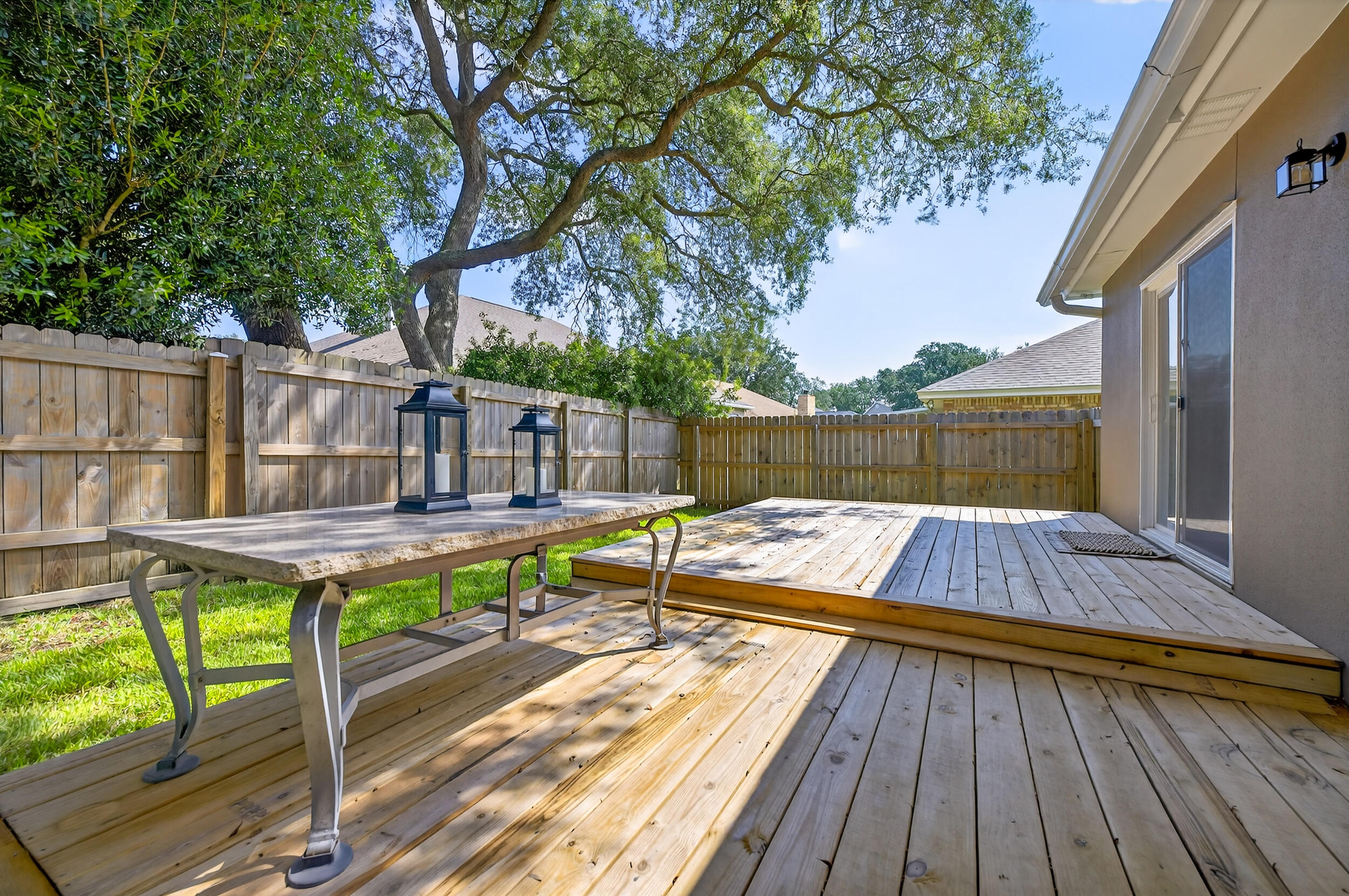 2805 Sam Snead Court Shalimar, FL 32579 - Photo 53 of 56 a view of backyard with a patio and wooden floor
