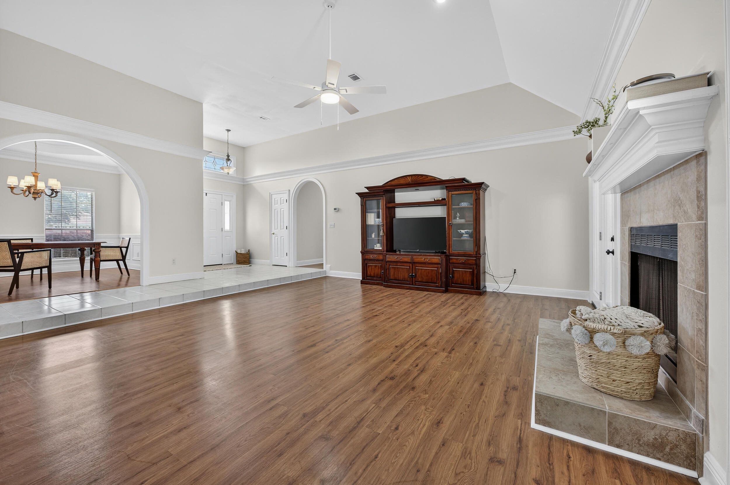 2805 Sam Snead Court Shalimar, FL 32579 - Photo 7 of 56 a living room with furniture and a fireplace