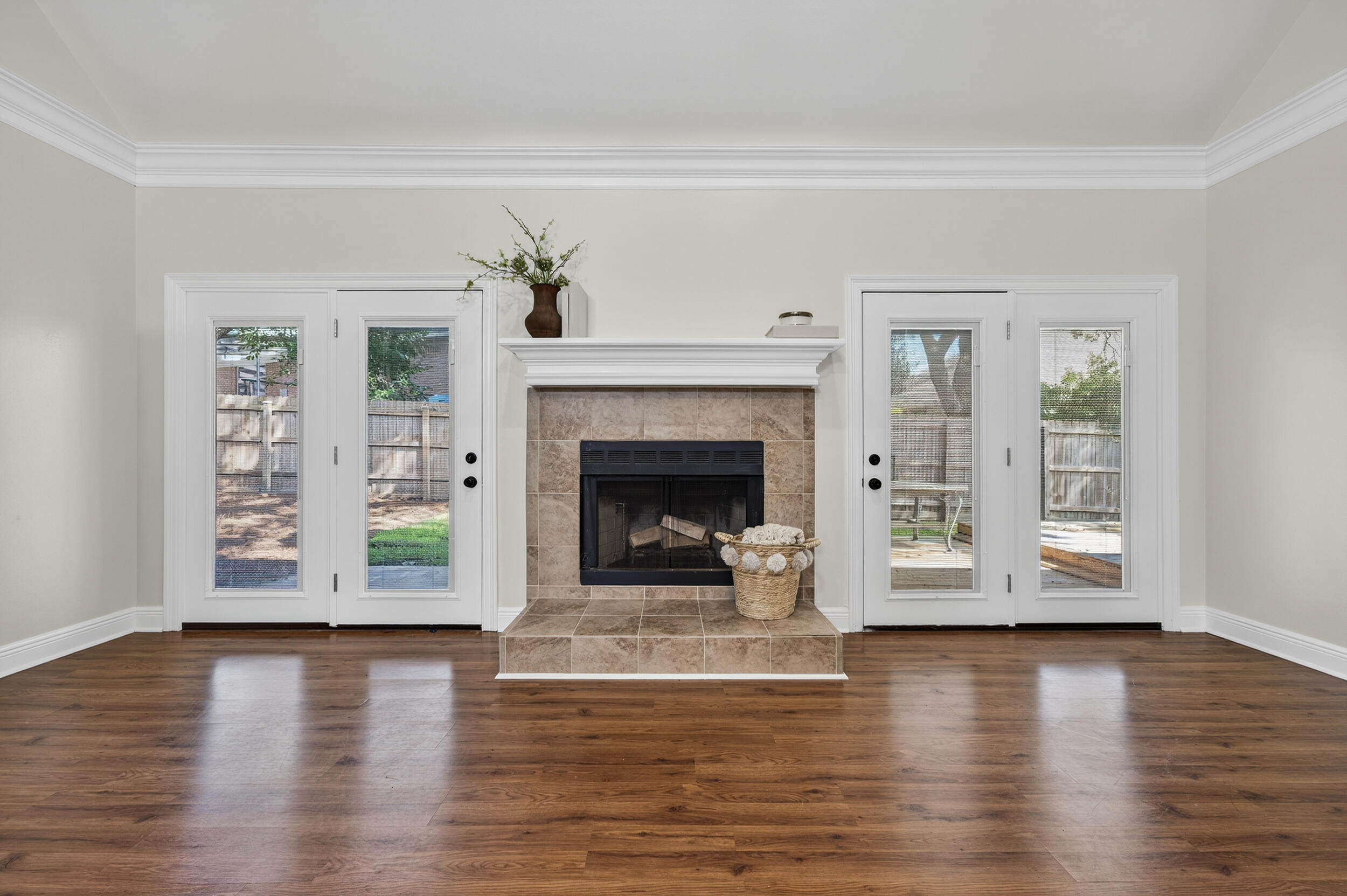 2805 Sam Snead Court Shalimar, FL 32579 - Photo 9 of 56 a view of a livingroom with a fireplace window and wooden floor