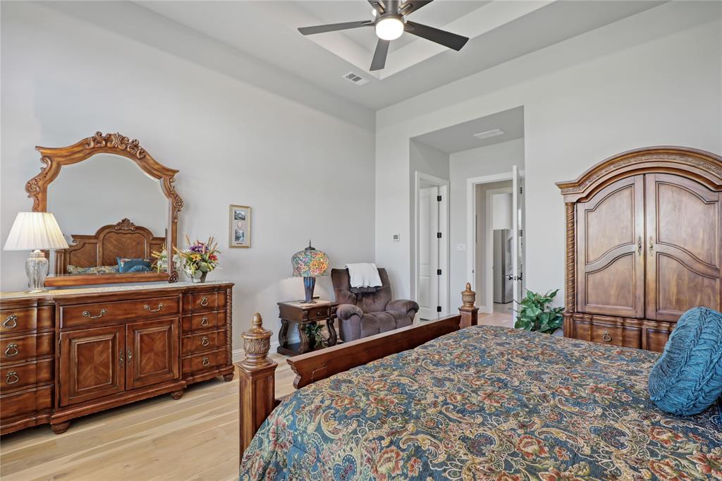 801 Lexington Lane Nevada, TX 75173 - Photo 14 of 40 Bedroom featuring light wood-style floors and a ceiling fan