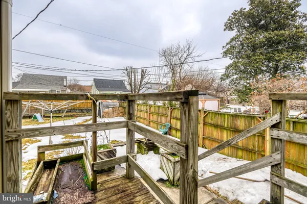 a view of a kitchen with a large window