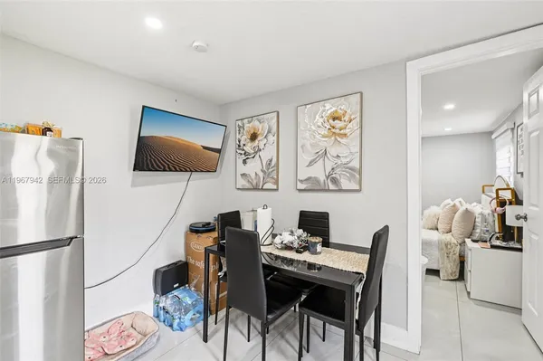 a kitchen that has a sink and a stove