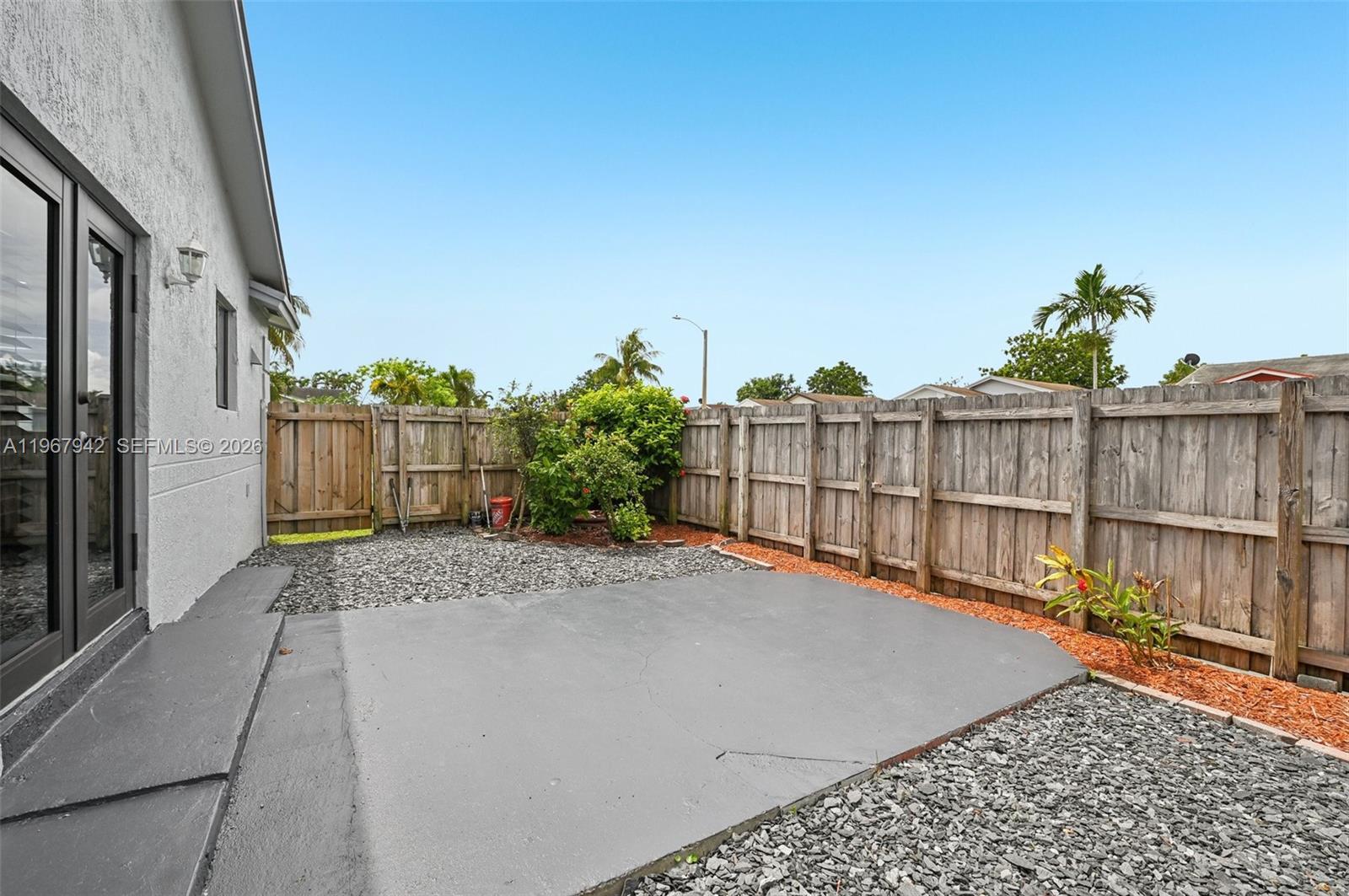 12237 Southwest 193rd Street Miami, FL 33177 - Photo 7 of 41 a view of a backyard