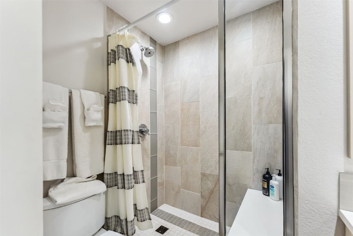 563 Bills Ranch Road Frisco, CO 80443 - Photo 24 of 50 Bathroom with toilet, a shower stall, and recessed lighting