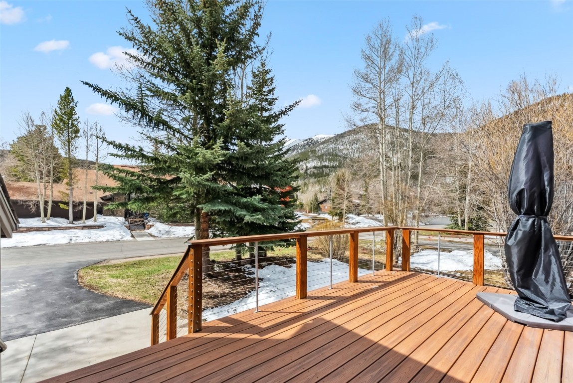 563 Bills Ranch Road Frisco, CO 80443 - Photo 34 of 50 Snow covered deck featuring a mountain view