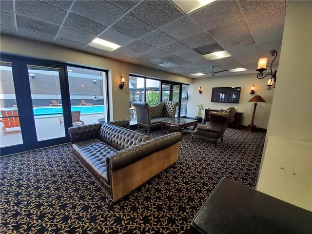 a kitchen with a sink and a stove top oven