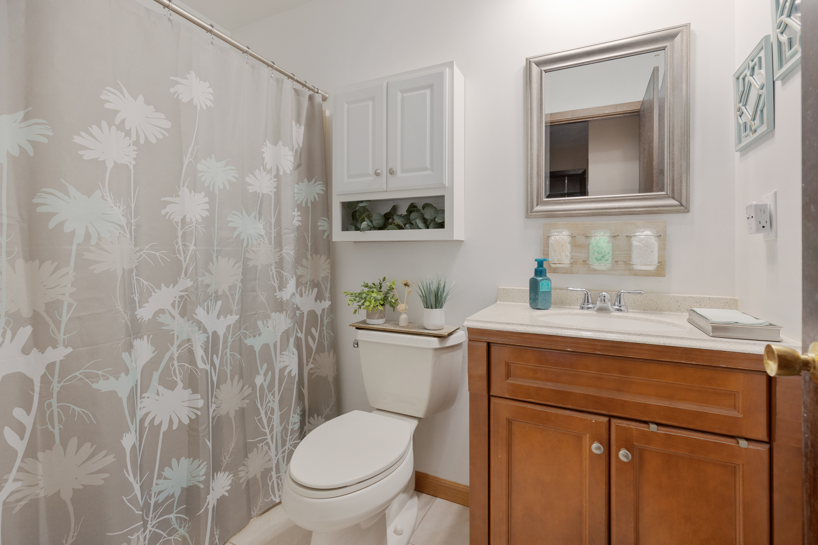 1065 Southgate Road New Lenox, IL 60451 - Photo 7 of 12 a bathroom with a toilet a sink and a mirror