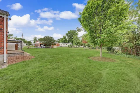 a view of a backyard with a garden