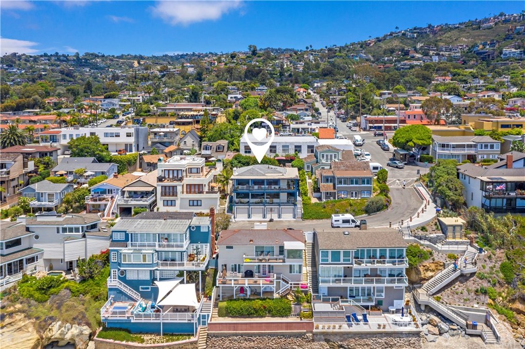 1782 Ocean Way Laguna Beach, CA 92651 - Photo 1 of 27 Perfectly positioned in the heart of Woods Cove, adjacent to the newly rebuilt stairs to the beach at Pearl Street.