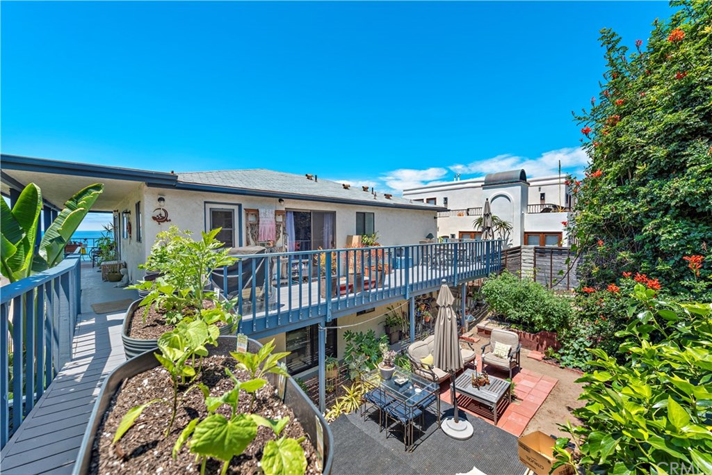 1782 Ocean Way Laguna Beach, CA 92651 - Photo 25 of 27 Rear deck of top unit with lower unit yard below.
