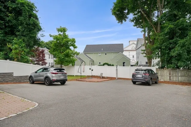 a view of a house with a door and wooden floor